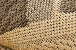 Okrągły dywan z sizalu, naturalny wygląd, świetny do nowoczesnych aranżacji