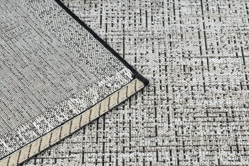 Dywan FLOORLUX 20401 wykonany z sizalu, trwały i stylowy w srebrno-czarnym odcieniu