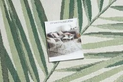 Zielony dywan sizalowy w stylu jungle, doskonały do nowoczesnych wnętrz