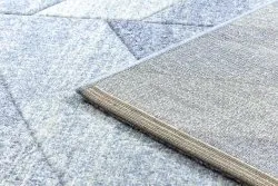 Nowoczesny dywan w jodełkę, miękki i stylowy, idealny do salonu