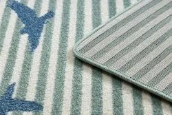 Nowoczesny dywan PETIT SAIL wykonany z miękkiego materiału, łódka w zielonym kolorze