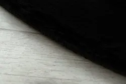 Okrągły dywan BUNNY w kolorze czarnym, doskonały do pokoju dziecięcego
