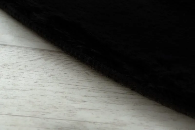 Okrągły dywan BUNNY w kolorze czarnym, doskonały do pokoju dziecięcego