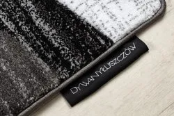 Stylowy dywan w szare pasy, idealny do nowoczesnych wnętrz