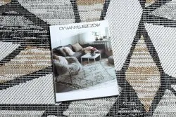 Stylowy dywan Cooper w odcieniach ecru i czerni, idealny do nowoczesnych aranżacji