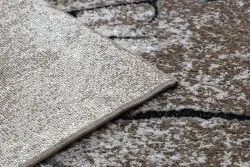 Strukturalny dywan COZY 8875 Wood, wykonany z wysokiej jakości runa w odcieniach brązu