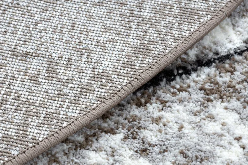 Strukturalny dywan COZY 8872, wykonany z dwóch poziomów runa, elegancki brązowy kolor