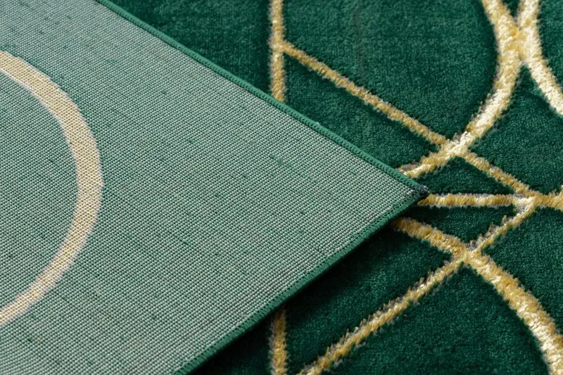 Dywan EMERALD o luksusowej fakturze, eleganckie koła w butelkowej zieleni i złotym wykończeniu