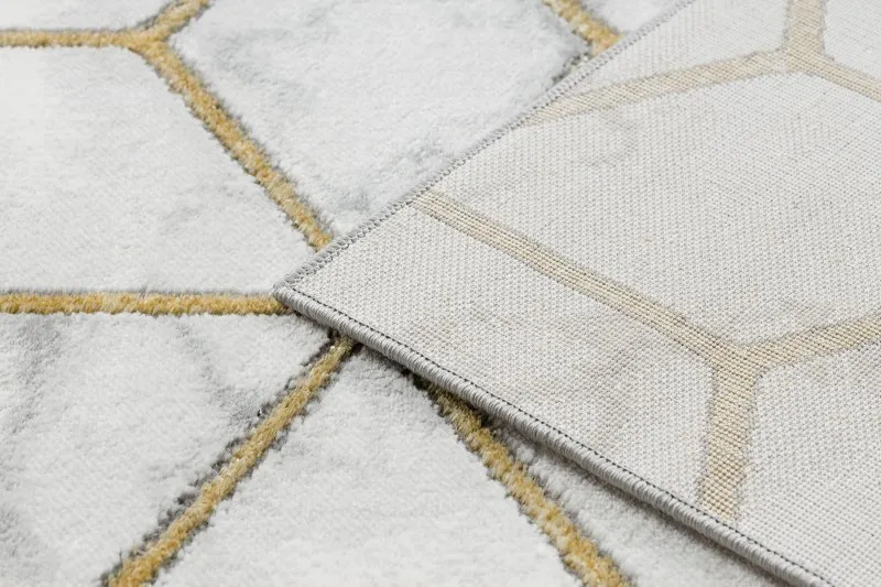 Luksusowy dywan EMERALD, elegancka faktura w kremowo-złotym kolorze, idealny do salonu