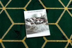 Stylowy dywan EMERALD w kolorze butelkowej zieleni z eleganckim złotym wykończeniem