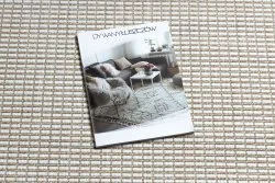 Stylowy dywan SION w odcieniach ecru i beżu, idealny do nowoczesnych wnętrz