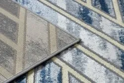 Strukturalny dywan DE LUXE o eleganckim wyglądzie, wykonany z wysokiej jakości materiałów