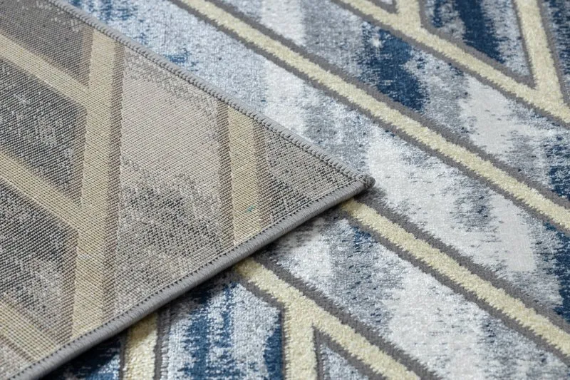 Strukturalny dywan DE LUXE o eleganckim wyglądzie, wykonany z wysokiej jakości materiałów