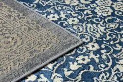 Strukturalny dywan DE LUXE 474 w odcieniach granatu i złota - elegancka tekstura