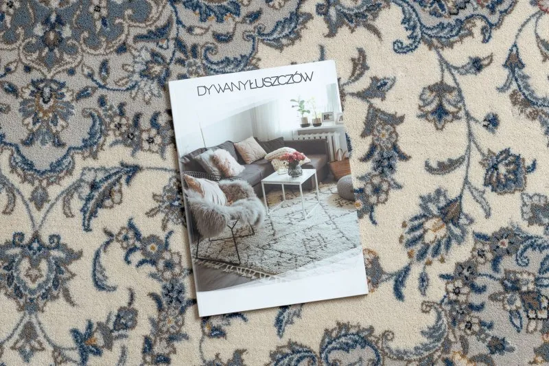 Stylowy dywan NAIN w odcieniach beżu i granatu, idealny do nowoczesnych aranżacji
