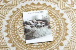 Kreatywny dywan FUN Napkin w kolorze złotym, idealny do nowoczesnych aranżacji