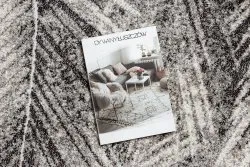 Nowoczesny dywan w szaro-beżowe liście palmowe, idealny do każdego wnętrza
