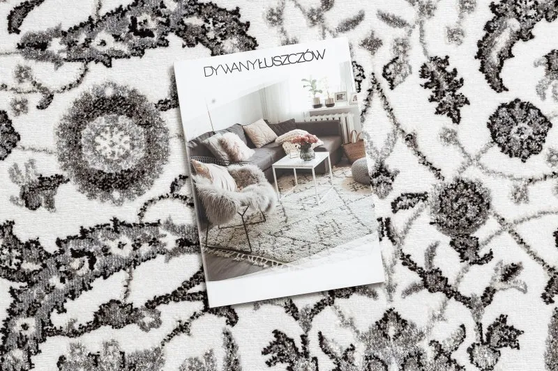 Stylowy dywan w szaro-kwiatowym designie, idealny do nowoczesnych wnętrz
