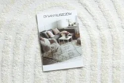Kremowy dywan w geometryczny wzór, stylowy dodatek do wnętrz