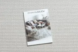 Okrągły dywan TIMO 5979 w białej ramce, stylowy dodatek do przestrzeni zewnętrznych