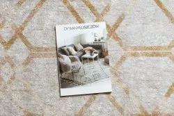 Złoty dywan MIRO 51805.804 w geometryczny wzór, idealny do prania