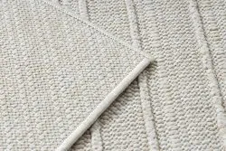 Strukturalny dywan w odcieniu kremowym, styl BOHO, doskonały do salonu