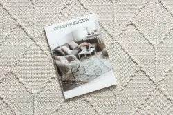 Kremowy dywan w stylu BOHO, strukturalny design, nowoczesny charakter