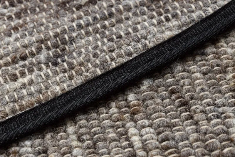 Naturalny, wełniany dywan o miękkiej fakturze, dwustronny design