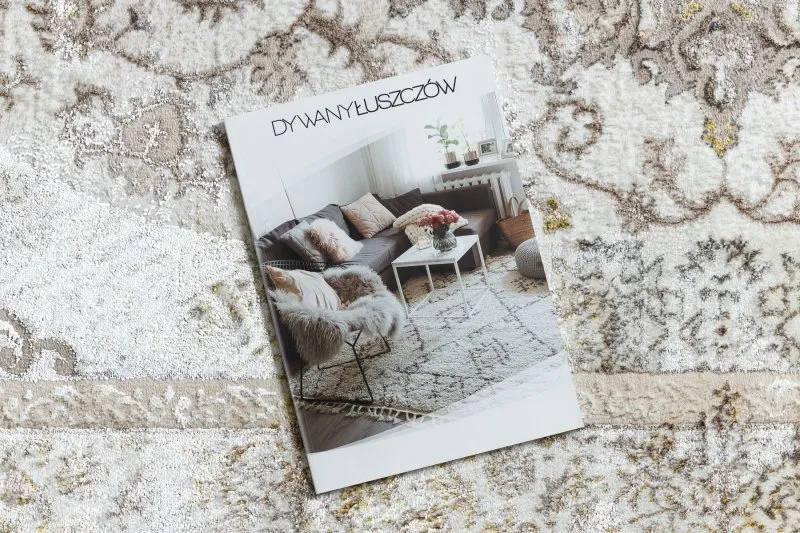 Strukturalny dywan w odcieniach kremu i beżu, idealny do nowoczesnych aranżacji