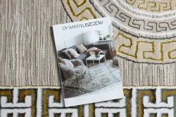 Elegancki dywan o strukturze, kremowo-złoty, do dekoracji nowoczesnych przestrzeni