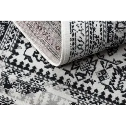 Dywan vintage beżowy, miękki i przyjemny w dotyku, idealny do sypialni
