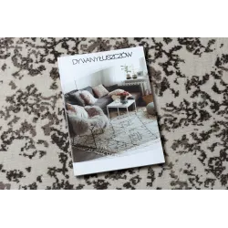 Stylowy dywan vintage w beżowym kolorze, doskonały do klasycznych wnętrz