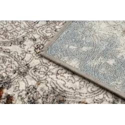 Miękki dywan wełniany o vintage wzorze, idealny do salonu lub sypialni