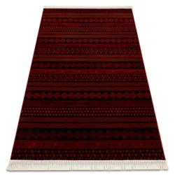 Orientalny dywan w bordo i czerni z frędzlami, klasyczny styl